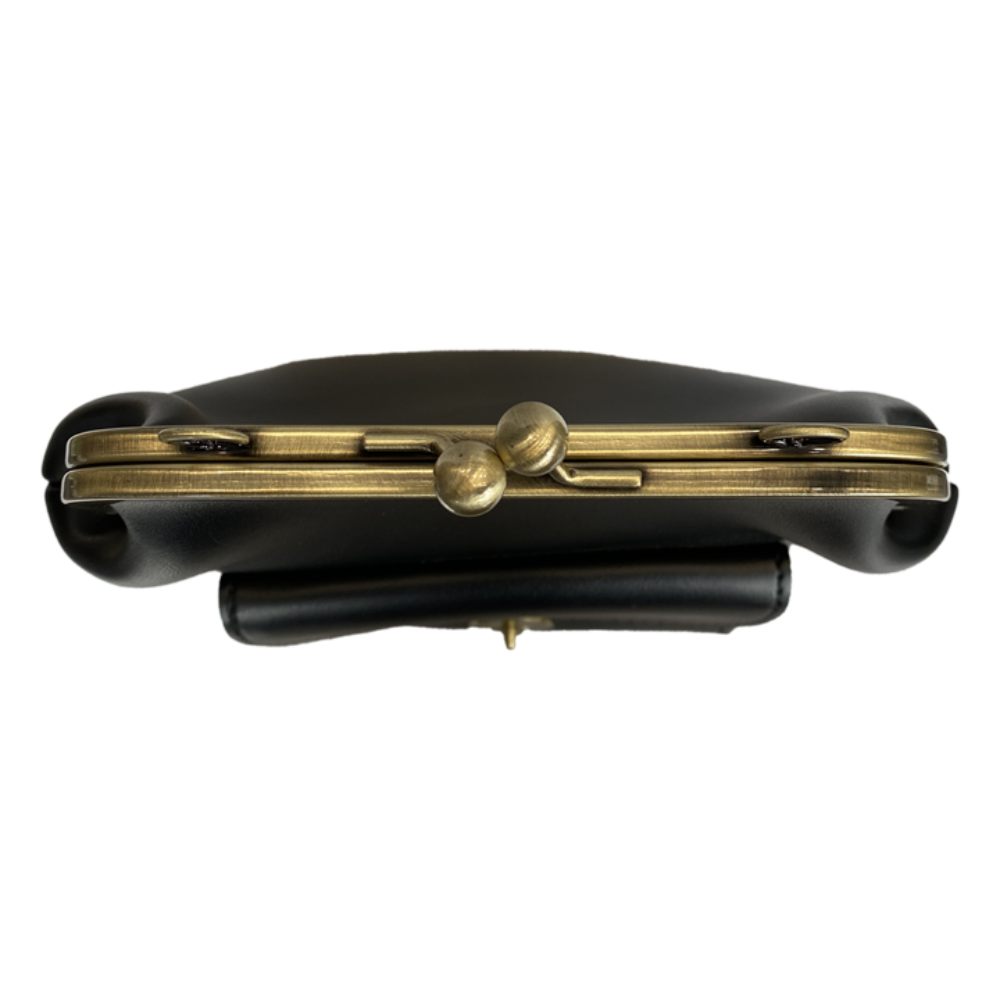 Torba Vintage Kiss Lock – niezbędny element stylu retro chic Grace